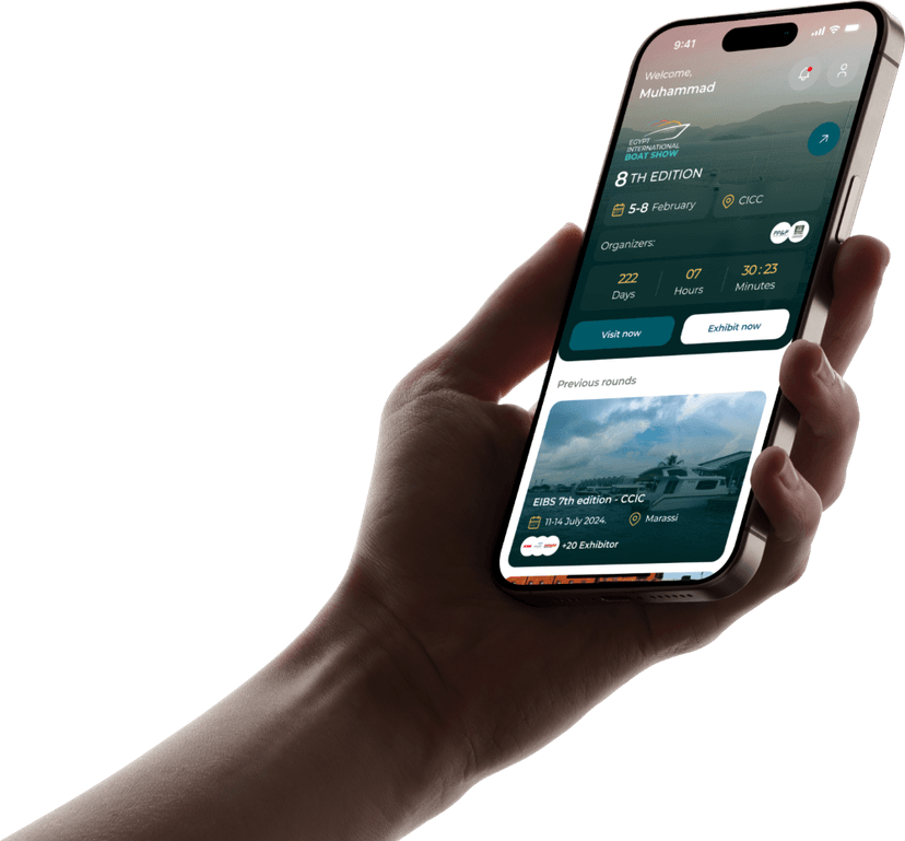 Hand holding smartphone with app interface